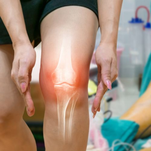 woman's knee photo showing a red halo as if it was painful due to inflammation

